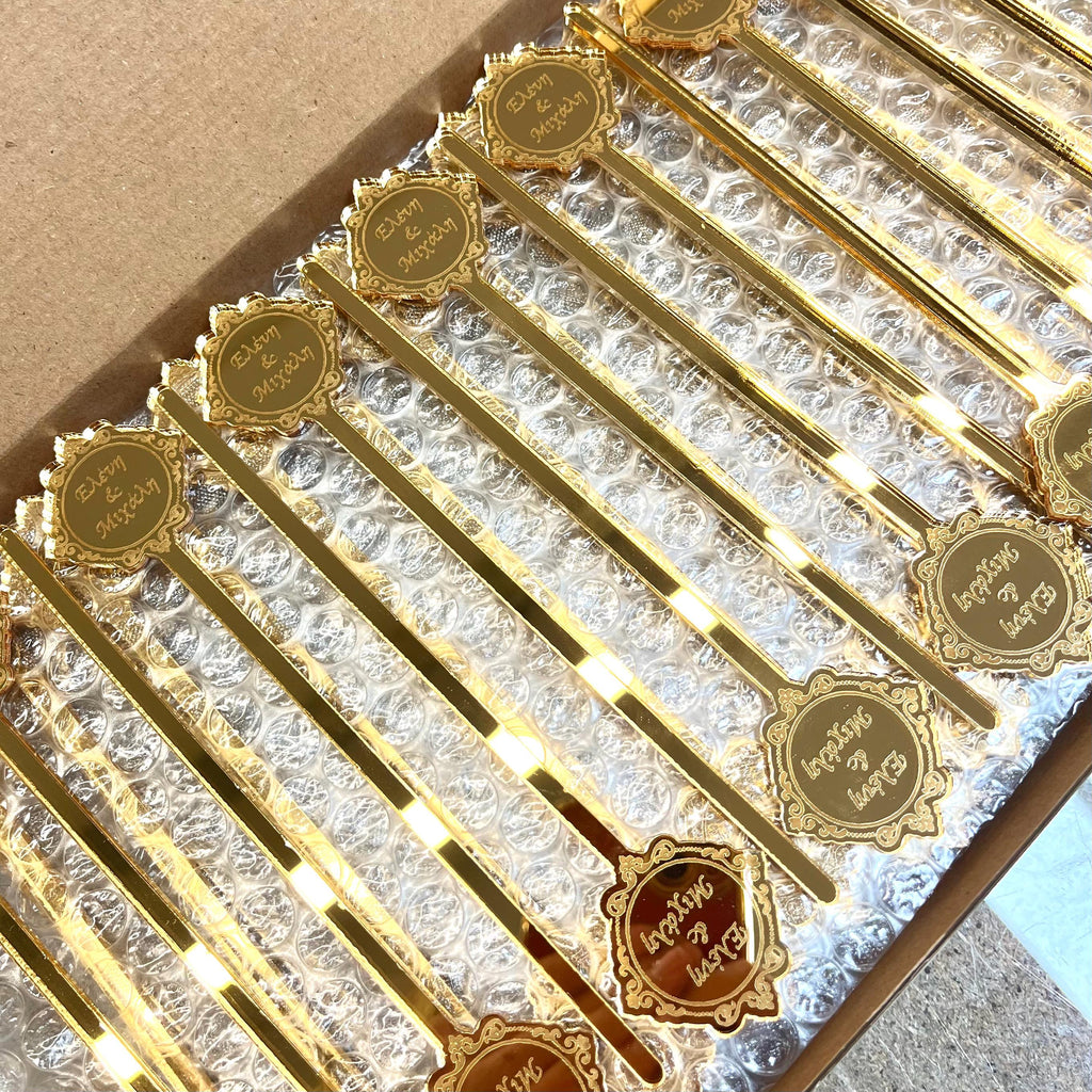 Set of personalized mirrored cocktail stirrers with laser-cut Greek names. Stirrers are packed in 2 paper boxes with extra bubble wrap for safe delivery by courier service.
