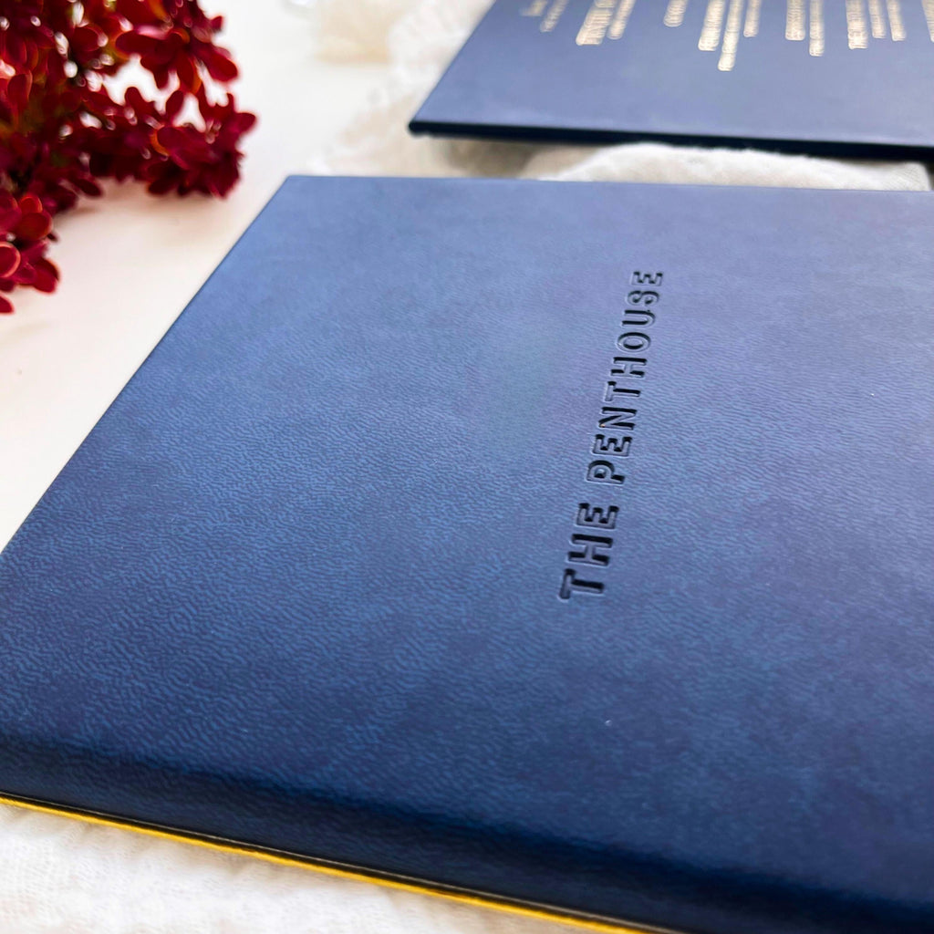 Luxurious Navy Blue Vegan Leather Menu - A deep embossed booklet that adds sophistication and charm. Perfect for creating a memorable dining experience, whether it’s a lavish wedding, exclusive cocktail party or special event.